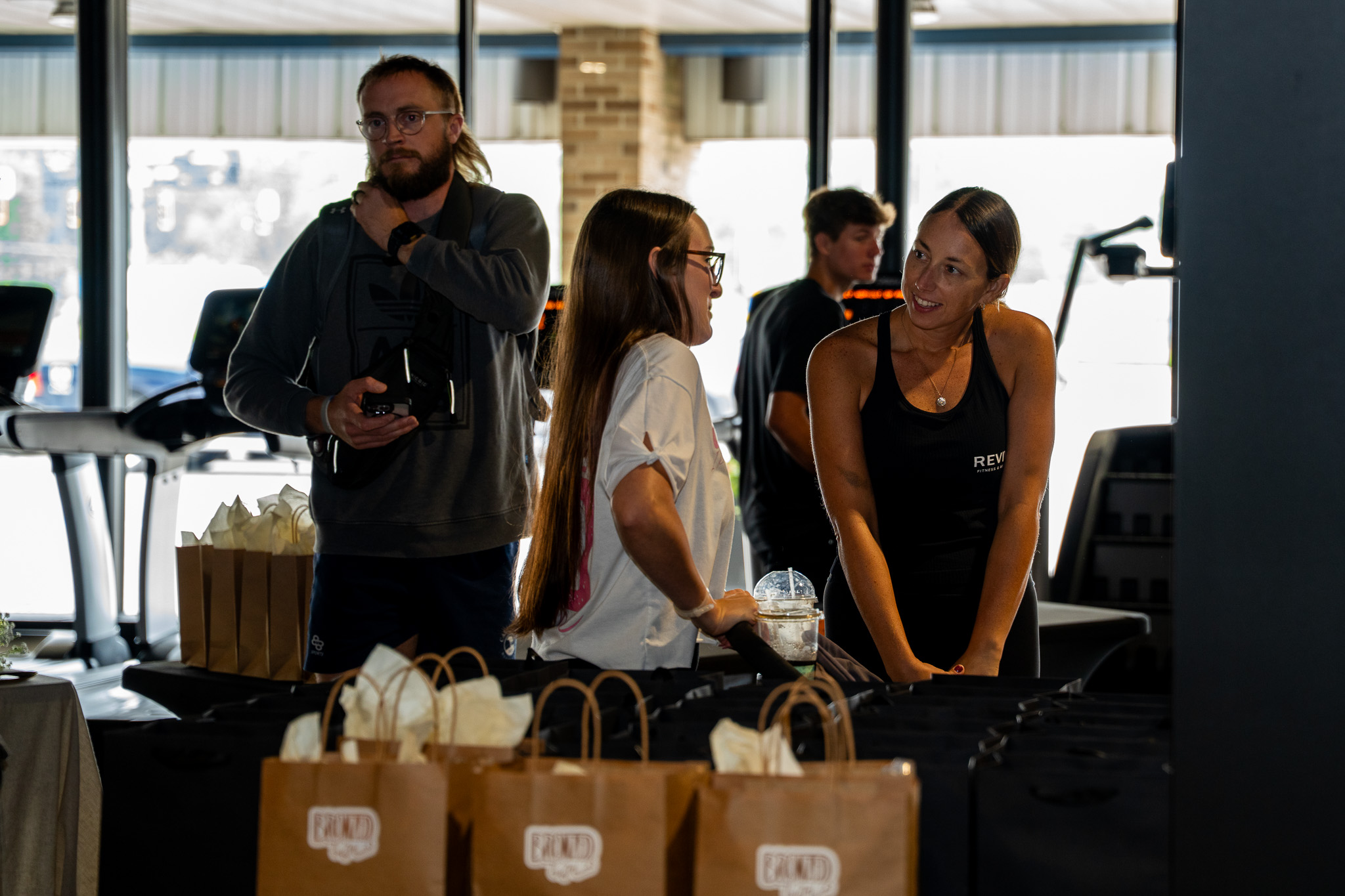 Jaqueline welcoming a member at the grand opening