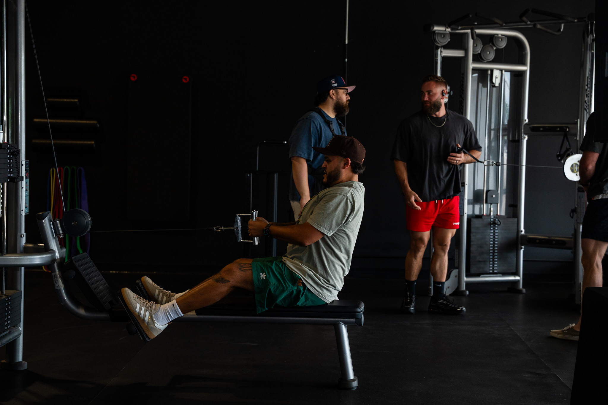 Using the rowing machine at the REVIVE grand opening